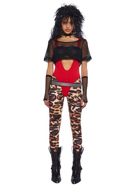 for going back to the '80s! This costume set has a stretchy jersey and sheer fishnet construction. Includes a cropped bandeau top, a short sleeve cropped tee, a unitard, leopard-printed leggings, a vegan leather belt, arm warmers, leg warmers, a spiked choker necklace, and a mullet wig.[Collection] Glam Rock Halloween Costume, Hair Band Costume 80's, Motley Crue Costume, 80s Groupie Fashion, Rock And Roll Theme Party Outfit, Rock Star Costume Women, Black Wig Halloween Costume, 80 Rock Outfits Women, Poison Costume