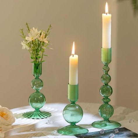 PRICES MAY VARY. Stylish Elegant Decoration: These candle holders for candlesticks feature a oblate spherical shape with elegant strips, adding a touch of delicate to any space. The multi-color allows you to blend with variety of candle colors, making them suitable for any season or decor style. Assorted Candleholder Set: This set features 3 vintage candlestick holders in varying shapes and sizes: measuring 4.72"/12 cm, 5.9"/15 cm, and 8.07"/20.5 cm in height. The candle sockets are 0.87"/2.2 cm Colored Glass Candlesticks, Tall Candle Holders Decor, Green Wedding Tablescape, Candle Stick Holders Decor, Green Wedding Centerpieces, Candle Colors, Glass Taper Candle Holders, Green Tablescape, Decor For Table