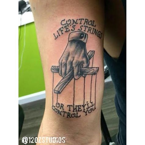 Cool black and grey Godfather themed tattoo hand puppet strings lettering male arm tattoo by Chris Curtis. God Father Tattoos, Puppeteer Tattoo Ideas, Puppet Tattoo Ideas, Puppet Master Tattoo, Godfather Tattoos, Godfather Tattoo Ideas, The Godfather Tattoo, Puppet Tattoo Design, String Tattoo