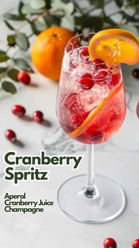 Cranberry Spritz Cranberry Aperol Spritz, Cranberry Orange Aperol Spritz, Cranberry Spritzer Cocktails, Champagne With Cranberries, Prosecco And Cranberry Cocktails, Champagne And Cranberry Juice, Winter Spritz, Cranberry Aperol Spritz Pitcher, Cranberry Sprite Cocktail