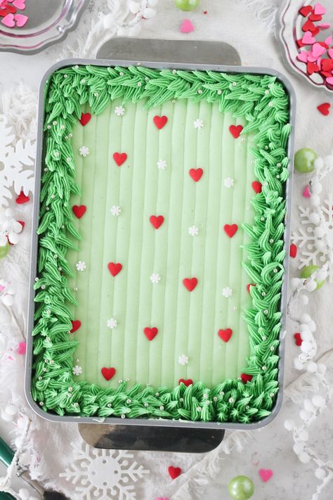 Christmas Grinch Pistachio Sheet Cake - Baking with Blondie December Potluck Ideas, Holiday Sheet Cakes, Christmas Buttercream Board, Grinch Birthday Cake, Christmas Sheet Cake, Snowflake Sprinkles, Pistachio Buttercream, Baking With Blondie, Grinch Cake