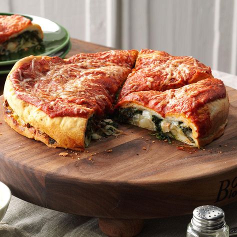 Spinach-Stuffed Pizza Recipe -I had my first stuffed pizza when I attended college near Chicago. I was amazed to see pizza well over an inch thick, with topping on the inside! When I served this version to my family, there are no leftovers. —Nancy Gilmour of Sumner, Iowa Pizza In Oven, Pizza Spinach, Frozen Bread Dough Recipes, Stuffed Pizza, Cartoon Ideas, Bread Dough Recipe, Frozen Bread Dough, Local Pizza, Vegetarian Meal Plan