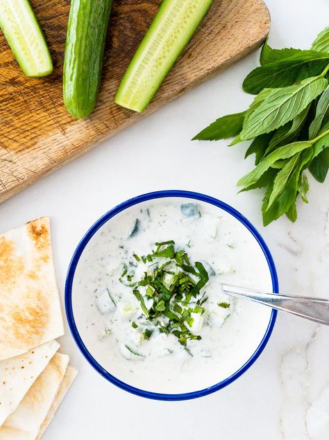 Bowl of cucumber yogurt salad. Cucumber Yogurt Salad, Yogurt Salad, Cucumber Yogurt, Mint Salad, Spicy Dishes, Grilled Beef, Eastern Cuisine, Summer Dishes, Large Salad Bowl