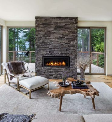 Exceptional forest house overlooking Cle Elum Lake, Washington Stone Fireplace Designs, Travertine Floor, Floor Marble, Coffee Table Design Modern, Outdoor Covered Patio, Contemporary Patio, Cozy Fireplace, Marble Floor, Country House Decor