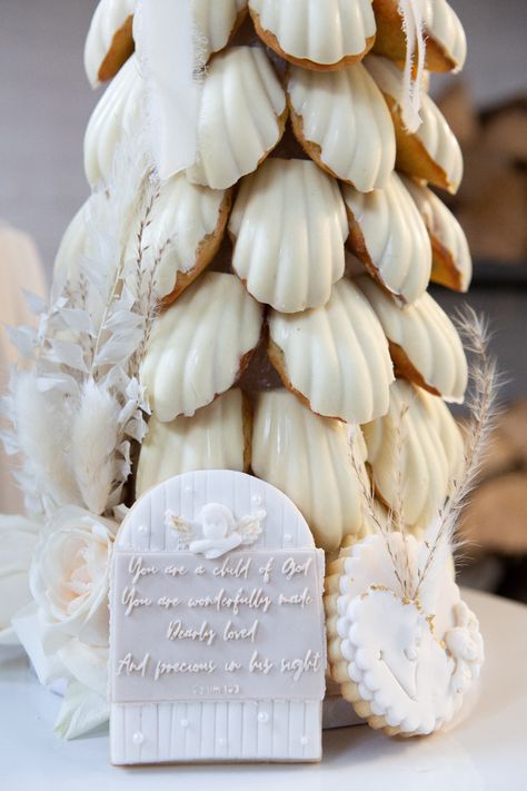 Callebaut white chocolate madeleine tower and custom fondant cookies for a boho baptism. Check us out on Instagram! Crocumboche Tower, Christmas Madeleines, Madeleine Tower, Macaroon Tree, Cookie Tower, Boho Baptism, Madeleine Cake, Madeline Cookies, Fourth Of July Cakes