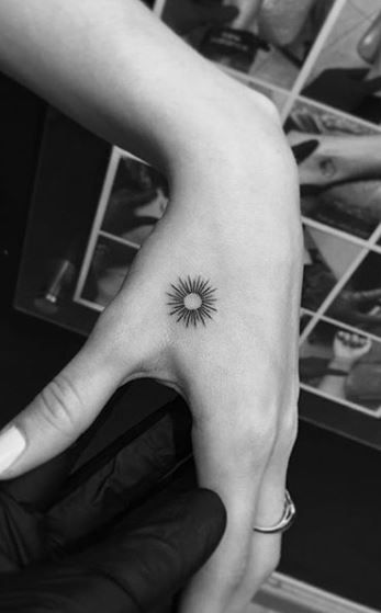 <<Check out the tattoos  #tattoomenow #tattooideas #tattoodesigns #micro #tiny #small #hand Micro Tattoo Placement Ideas, Tiny Sunflower Tattoo Simple Finger, Sunshine Hand Tattoo, Sunshine Tattoo Wrist, Micro Hand Tattoo, Miniature Tattoos For Women, Micro Sun Tattoo, Sun Tattoo On Hand, Yellow Ink Tattoo