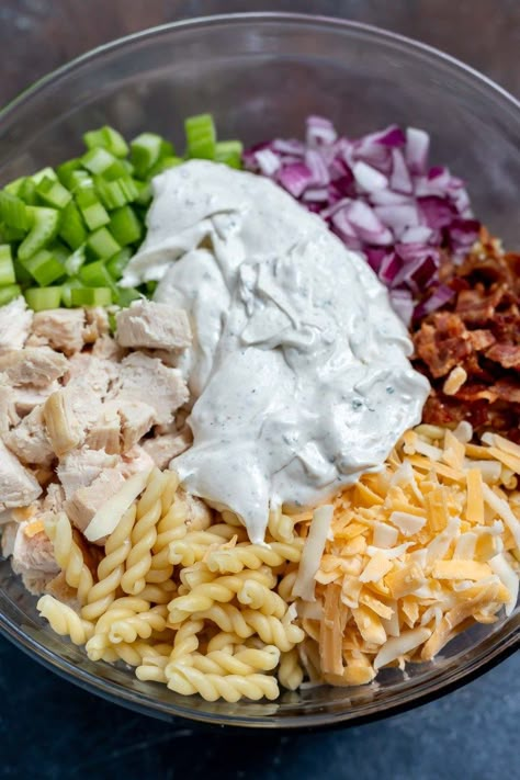 Chicken Bacon Ranch Pasta Salad is practically a meal all by itself. This easy pasta salad recipe is great for picnics, parties, barbecues or potlucks. The perfect side dish to please a hungry crowd! #pastasaladrecipes #pastasalad #sidedishrecipes #chickenbaconranch - chicken bacon recipes - pasta salads recipes - ranch pasta salad - pasta salad recipes cold - pasta salad meal prep Chicken Bacon Ranch Pasta Salad, Chicken Bacon Recipes, Bacon Pasta Recipes, Bacon Pasta Salad, Chicken Pasta Salad Recipes, Bacon Ranch Pasta, Bacon Ranch Pasta Salad, Cold Pasta Salad Recipes, Chicken Bacon Ranch Pasta