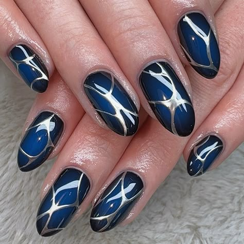 blue and silver cyberpunk nails ⛓️‍💥💙 gel polish manicure w/ hand painted nail art <3 @stellar_gel - stellar bond - stellar base - stellar black - out of the blue - stellar shine top @madam_glam - 35% off code - jadeaesthetic35 - silver chrome gel paint #auranails #auranailart #cyberpunk #cyberpunknails #silvernails #editorialnails #gelnails #gelpolishnails #gelpolishnailart #naturalnails #naturalnailinspo #blacknails #bluenails #stellargel #madamglam #nailpromagazine #nailsmagazine #n... Dark Blue Chrome Nails Designs, Blue And Silver Chrome Nails, Navy Blue And Black Nails, Blue Goth Nails, Dark Blue And Silver Nails, Dark Blue Chrome Nails, Blue And Silver Nail Designs, Midnight Blue Nails, Cyberpunk Nails