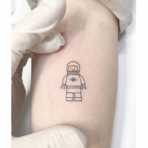 Lego Tattoo Design, Matching Lego Tattoo, Small Gaming Tattoo, Lego Man Tattoo, Lego Tattoo Ideas, Lego Tattoo, Pirate Ship Tattoos, Tato Flash, Astronaut Tattoo