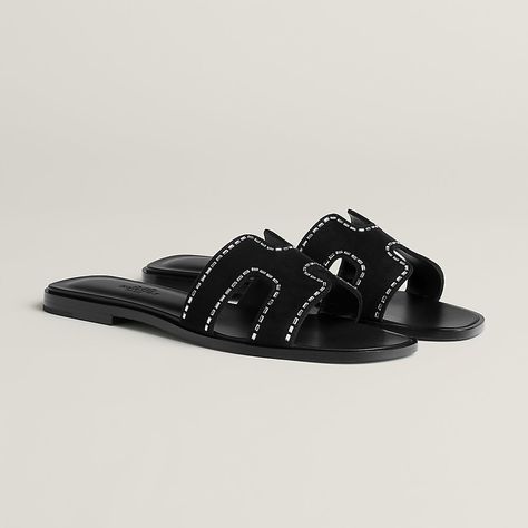 Sandal in calfskin with iconic "H" cut-out and rhinestone details. An iconic Hermès style, this silhouette is an essential piece in every wardrobe. We recommend sizing up if you are in-between sizes. Hermes Sandals, Hermes Oran Sandals, Hermes Style, Hermes Oran, Black Leather Heels, Comfortable Sandals, Sandals Black, Sneaker Heels, Office Fashion