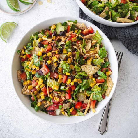 Fresh veggies, black beans, cheddar cheese, and super crispy tortilla chips make this family-friendly Tex Mex salad for all summer long. Mex Salad, Sides With Tacos, Tex Mex Salad, Mexican Salad, Cold Salads, Canned Black Beans, Fresh Veggies, Tex Mex, Tortilla Chips