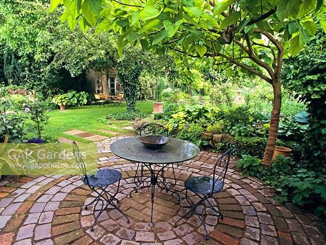 Sitting Area Under Tree, Sloped Landscaping, Sitting Ideas, Tree Garden Design, Backyard Sitting Areas, Cool Backyard, Garden Sitting Areas, Patio Gardening, Stone Garden Paths