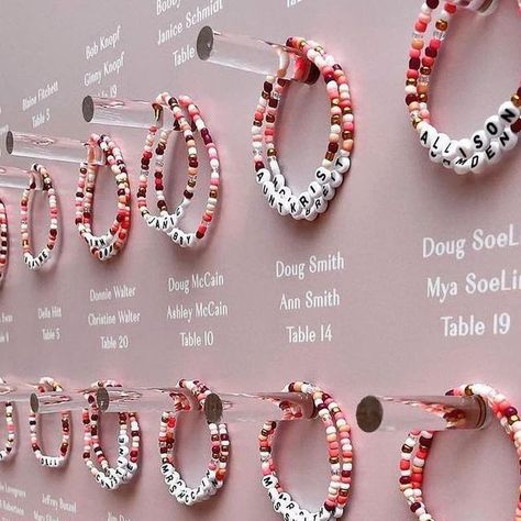 Lovely Bride ™ on Instagram: "#TheLovelyList // BFF bracelets make for the sweetest seating chart. 💕 This couple love making bracelets with their nieces and nephews, and wanted their guests to leave with the same family feeling. 🥹 ____ @bashplease @pitbullsposies @ambermoondesign" Wedding Bracelet For Guests, Bracelets Wedding, Making Friendship Bracelets, Inside Joke, Wedding Wall, Card Display, Wedding Name, Future Wedding Plans, Seating Chart Wedding