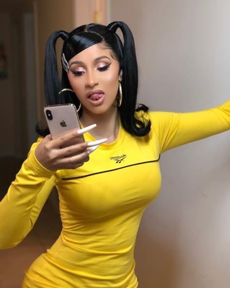 Cardi B is spicing up her life with a throwback hairstyle. The rapper posted an image to Instagram wearing half-up pigtails courtesy of a lace-front wig made Cardi B Pics, Cardi B Photos, Pigtail Hairstyles, Image Skincare, Baddie Hairstyles, Grunge Hair, Cardi B, Black Girls Hairstyles, Nicki Minaj