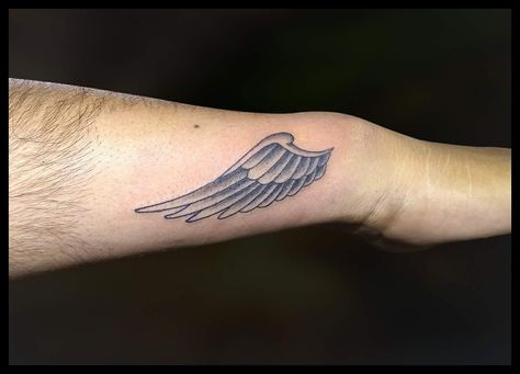 single Wing Tattoo on wrist. #wingtattoo #smallwingtattoo #angeltattoostudioindore #indoretattooartist follow on Instagram: angeltattoostudio_Indore Wrist Wings Tattoo, Wings On Wrist Tattoo, Single Wing Tattoo, Angle Wing Tattoos, Wing Tattoos On Wrist, Small Wings Tattoo, Small Angel Wing Tattoo, Tattoo On Wrist, Om Tattoo Design