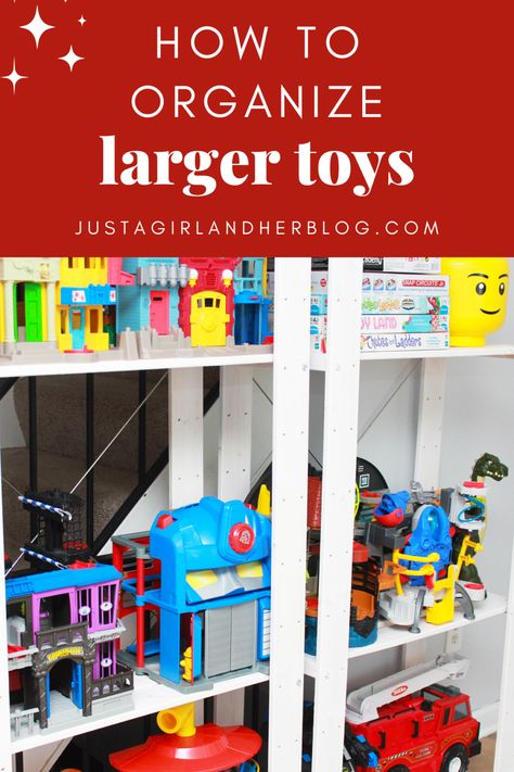 Toys Rack Storage Ideas, Storing Large Toys In Playroom, Organizing Big Toys Small Spaces, Organizing Big Toy Trucks, Toy Storage Room Ideas, Large Playset Storage, Storeroom Organization Storage Ideas, Car Track Toy Storage, Toy House Storage Ideas