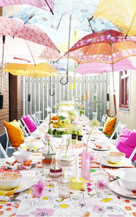 Create a fun canopy of umbrellas and mix and match fabric and serving ware in bright, fun colors for an outdoor party that’s sure to welcome the season. Wedding Shower Brunch Decorations, Wedding Shower Brunch, Cozy Wedding, Brunch Decor, Tafel Decor, Spring Party, April Showers, Party Entertainment, Garden Cottage