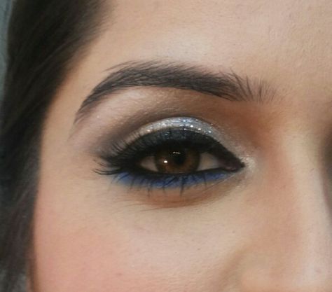 Silver and electric blue eye makeup  Each bridesmaid would have the color of her guardian under her eye Blue Saree Makeup Look Simple, Sky Blue Saree Makeup Look, Blue Saree Eye Makeup Look, Eye Makeup For Blue Saree, Silver Saree Makeup Look, Eye Makeup For Sky Blue Dress, Blue Kajal Eye Makeup, Blue Eye Makeup Indian, Blue Saree Makeup Look