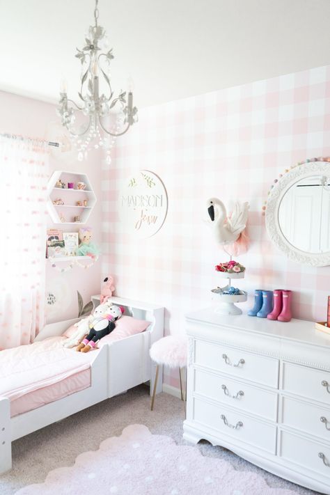 Our daughters updated bedroom with pink gingham wallpaper! We love changing up our spaces with removable wallpaper and this pink buffalo check is perfect. Full room tour here! #pinkginghamwallpaper #pinkgingham #pinkbuffaloplaid #toddlergirlsroom #toddlerroom #nurserydecor #toddlerdecor #girlsroomdecor #toddlerbed Pink Gingham Wallpaper, Gingham Wallpaper, Toddler Decor, Zipper Bedding, Toddler Girl Room, Toddler Rooms, Girl’s Room, Toddler Bedrooms, Big Girl Rooms