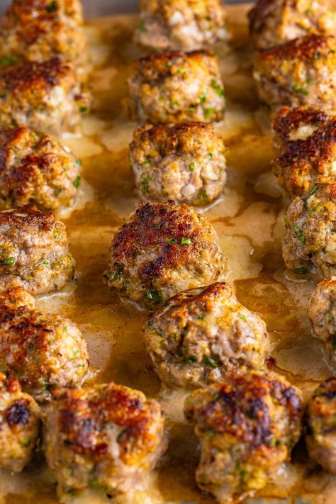 This Italian meatball recipe is a warm embrace from Italy, offering a blend of tender meat, aromatic herbs, and rich cheeses that'll transport your taste buds straight to an Italian grandma's kitchen. Sausage Meatballs Recipes, Best Italian Meatball Recipe, Moist Meatballs, Italian Sausage Meatballs, Classic Italian Meatballs, Homemade Italian Meatballs, Italian Meatball, Sausage Meatballs, Italian Meatballs Recipe