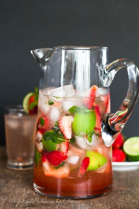 Super easy pitcher of strawberry mojito is perfect for any cocktail party. Refreshing, fun and irresistibly tasty! Mojito For A Crowd, Mojito Recipe Pitcher, Mojito Pitcher, Pitcher Drinks, Strawberry Mojito, Strawberry Mint, Mojito Recipe, Slushies, Summer Cocktails