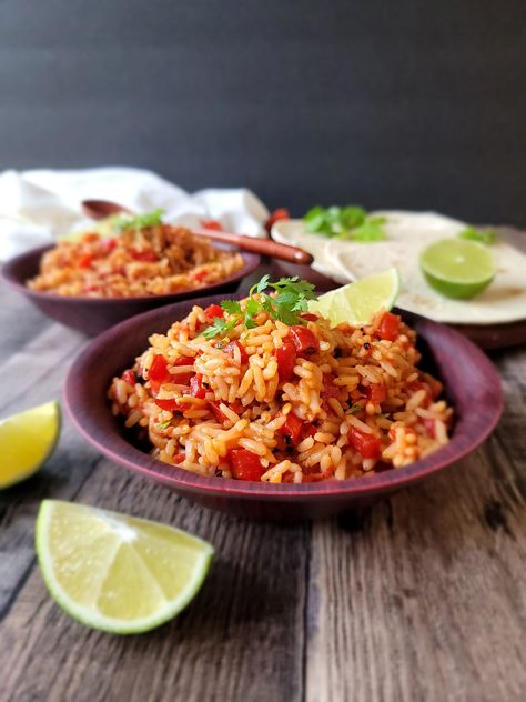 Traditional Mexican Rice, Family Feast Recipes, Mexican Rice Recipes, Mexican Rice, Fire Roasted Tomatoes, Traditional Mexican, Fire Roasted, Fresh Lime, Roasted Tomatoes