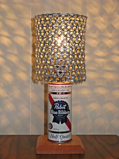 Here is a lamp that I made using a vintage recycled Pabst Blue Ribbon beer can. The lamp shade is constructed using recycled beer can tabs ... Can Lamp, Beer Crafts, Diy Pop, Pabst Blue Ribbon Beer, Pabst Blue Ribbon, Upcycled Art, Diy Recycle, Vintage Beer, Diy Lamp