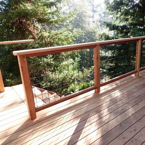 Do you have a strategy to remodel your home exterior in the future? If yes, it seems that the fencing can be one from the list to be enhanced or adjustment. Hog Panel Fence, Wild Hog Railing, Wire Deck Railing, Panel Fence, Deck Skirting, Cabin Deck, Deck Railing Ideas, Patio Railing, Deck Railing Design