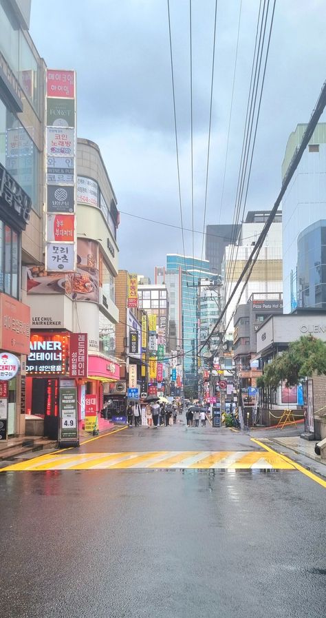 Hongdae on a rainy day🌧 #seoul #hongdae #rain #city #street #aesthetic #wallpaper #korealandscape Korea Rain Aesthetic, Hongdae Street Aesthetic, Street Aesthetic Wallpaper, Korea Street Wallpaper, City Street Aesthetic, Korea Streets Wallpaper, Hongdae Street, Seoul Hongdae, Street Wallpaper