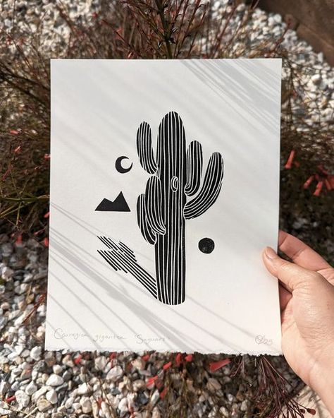 Olivia Yuen on Instagram: "Carnegiea gigantea (Saguaro cactus)🌵 The image of the Saguaro cactus is so common in Sonoran desert art, that I hesitated up until this point to create a print of one. I decided to make a simple design that celebrates it's recognizable form and unique structure." Cactus Screen Print, Cactus Lino Print, Desert Linocut, Cactus Linocut, Linocut Prints Simple, Print Carving, Lino Cut, Linocut Art, Wood Block Printing