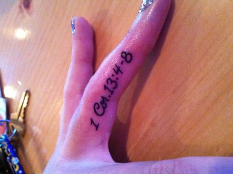 Bible verse definition of love on ring finger Bible Verse Finger Tattoo, Self Love Ring Finger Tattoo, Jesus Finger Tattoo, Verse Tattoos For Women, Cross On Ring Finger Tattoo, Verse Tattoos For Men, Cursive Ring Finger Tattoo, Tattoo Bible Verse, Bible Verse Tattoos For Men