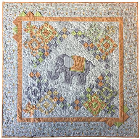 This baby quilt has fun, easy, and large appliqué pieces, ideal for those learning how to appliqué. The elephant is surrounded by pieced blocks, all set on point. The newest baby in your life will love their own, sweet elephant! Elephant Quilt Block, Elephant Quilts Pattern, Circle Quilt Patterns, Sweet Elephant, Girl Quilts, Quilt Applique, Elephant Quilt, Kids Quilts, Elephant Walk