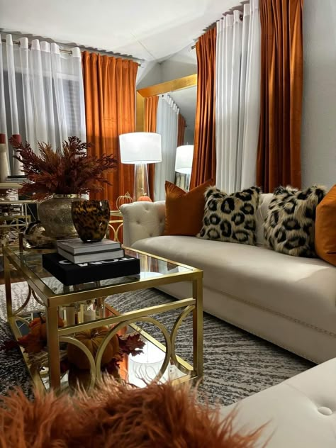 Rust Black And Cream Living Room, Cognac Living Room Ideas, Burnt Orange And Grey Living Room, Grey And Burnt Orange Living Room, Brown And Orange Living Room Ideas, Orange Apartment Decor, Nude Living Room Ideas, Orange Grey Living Room, Black And Orange Living Room