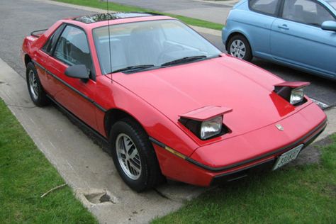 Famous for Catching Fire: Pontiac Fiero. There's no question the Pontiac Fiero had its faults, such as engine fires, but the car still had many excellent attributes that were never fully recognized. Fiero Gt, Pontiac Fiero Gt, Ford Pinto, Pontiac Fiero, Pontiac Cars, Nissan 240sx, Speed Racer, Big Three, Gas Mileage