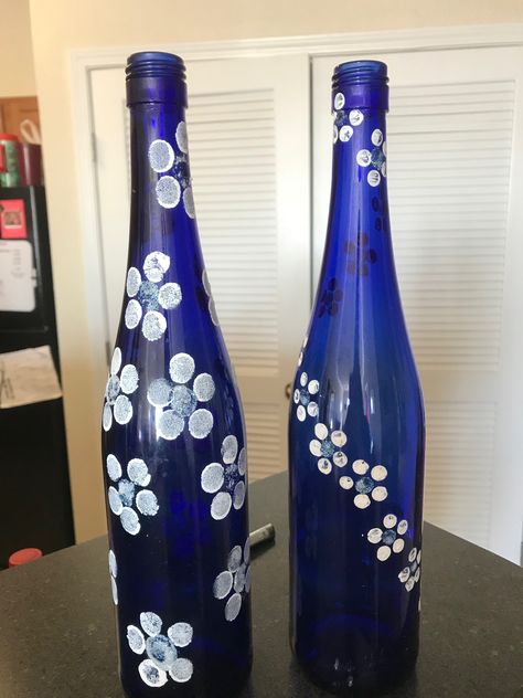 $40 beautiful flower wine bottles ACDesign36@gmail.com Senior Banquet, Diy Painted Vases, Reuse Wine Bottles, Jars Ideas, Blue Wine Bottles, Painted Bottles, Cap Art, Hand Painted Bottles, Bottle Cap Art