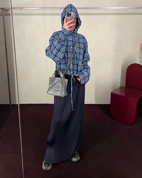 Acne Studios' dusty blue flannel check hooded jacket and silver coated denim mini tote styled with the Pleats Please long navy skirt and Kiko Kostadinov ASICS Gel-Flammae sneakers. ⁠ ⁠ Shop new arrivals from Acne Studios by following the link in our bio. Blue Check Skirt Outfit, Kiko Kostadinov Asics, Long Navy Skirt, Checked Skirt Outfit, Print Jeans Outfit, Blue Check Skirt, Coated Denim, Silver Skirt, Kiko Kostadinov