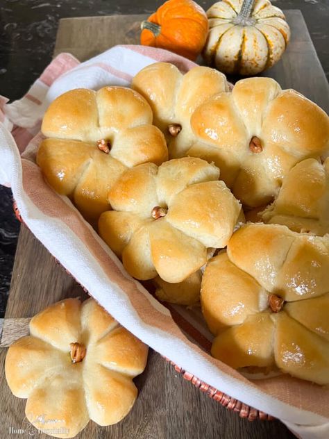 These pumpkin rolls are so easy to make using frozen dinner roll dough and kitchen shears. They're the perfect extra touch for Thanksgiving dinner or any special fall meal! Dinner Rolls Shaped Like Pumpkins, Rhodes Pumpkin Shaped Rolls, Bread Rolls Thanksgiving, Turkey Rolls For Kids, Best Rolls For Thanksgiving Dinner, Rolls Shaped Like Pumpkins, Pumpkin Shape Rolls, Thanksgiving Pumpkin Roll, Home Made Thanksgiving Rolls