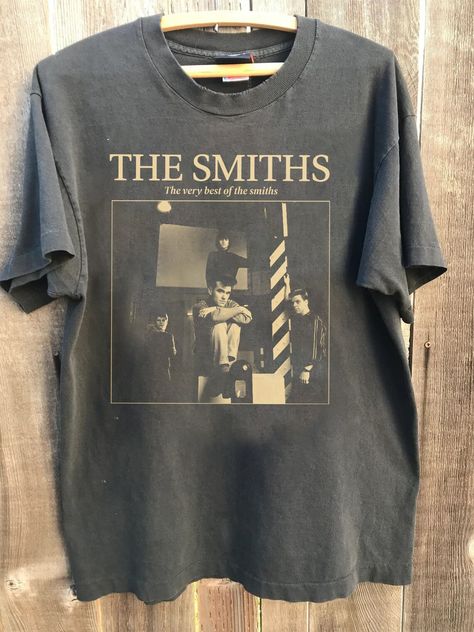 The Smiths Graphic Shirt, The Smiths music, The Smiths tee Gift for fans Comfort color Shirt, Gift for Women Men shirt ABOUT MATERIAL: Comfort Colors® 1717 Made with medium fabric (6.1 oz/yd² (206.8 g/m consiting of high quality, 100% ring-spun US cotton for long-lasting comfort. The relaxed fit keeps the wearer comfy in both casual and semi-formal settings while the crew neckline delivers that classic, neat style which makes it perfect for accessorizing. What's more, the pre-shrunk fabric ensur The Smiths Band Tee, Where To Buy Band Tees, The Smiths Tee Shirt, The Smiths Graphic Tee, The Smiths Shirt Aesthetic, The Smiths Clothes, Vintage Tee Aesthetic, Sleep Shirt Aesthetic, The Smiths Hoodie