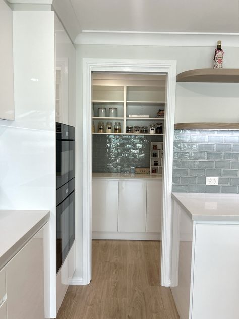 Custom designed and manufactured walk in pantry, with a good amount of storage space, stone benchtop and tiled splashback. #wip #butlerspantry #butlerspantryideas #butlerspantrygoals #butlerspantryinspo #kbecastlehill #kitchensbyemanuel #custombutlerspantry #pantryinspo #custompantry #customstoragespace #openshelving #kitchenideas #walkinpantrydesign #walkinpantrygoals Tiled Pantry, Zephyr And Stone, Tiled Splashback, Butlers Pantry Ideas, Stone Benchtop, Tile Splashback, Custom Pantry, Butler’s Pantry, Butlers Pantry