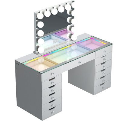 This modern dressing table is equipped with an LED transparent glass desktop, and the dressing table has 7 lighting modes. Press and hold the button to adjust it according to different scenes and makeup needs. The oversized Hollywood LED makeup mirror has 14 dimmable LED bulbs, the mirror base is detachable, the LCD touch screen display, two Bluetooth speakers, and there are sockets and USB charging ports to meet your different needs for home makeup, salon or live broadcast. The spacious transpa Classic Dressing Table, Modern Dressing Table, Elegant Vanity, Daybed Mattress, Traditional Vanity, Vanity Table Set, Small Space Bedroom, Led Makeup Mirror, Teen Bedroom Furniture