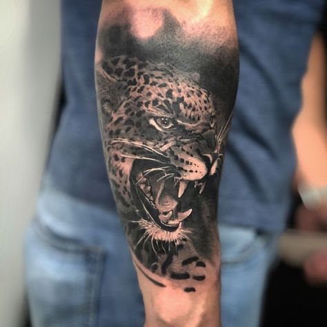 For similar reasons, the Leopard is also known to symbolize power and skills. When it comes to instincts nothing can beat the way that a Leopard can adapt and manipulate situations to work for their favor. Because of this, Leopards are also the symbol for cunningness and capability! #tattoo #tattoodesign #tattooing #leopard tattoos # tattoo ideas # modern leopard tattoos # inspirational leopard tattoo ideas # tattoo for animal lover # tattoo for men # tattoo for women # tattoo on shoulder Guadalajara Tattoo, Leopard Tattoo Ideas, Animal Lover Tattoo, Leopard Tattoo, Jaguar Tattoo, Viking Tattoo Sleeve, Feminine Symbols, Leopard Tattoos, Web Tattoo