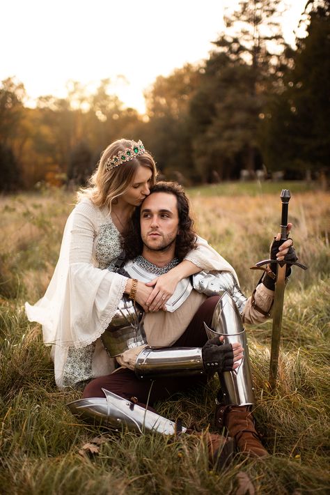 An engagement shoot at an abandoned castle with a fairytale couple, wearing a princess dress and armor at sunset Romantic Medieval, King And Knight, Fantasy Engagement Photoshoot, King And Queen Wedding, Renfaire Outfit Couple, Lotr Engagement Photos, King And Queen Photoshoot, Game Of Thrones Photoshoot, Medieval Photo Shoot