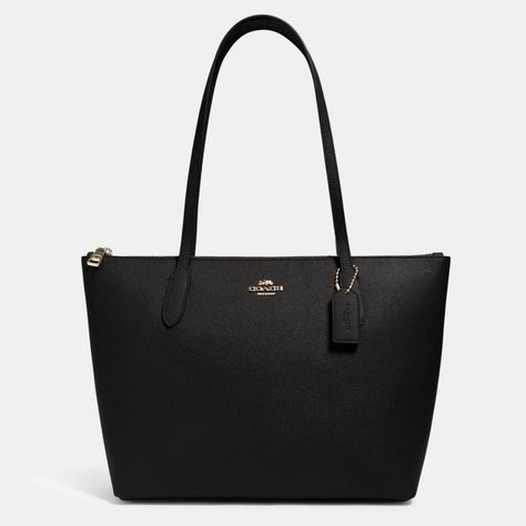 Get this COACH Zip Top Tote Handbag (available in 2 colors) for only $99 (reg. $278) at the COACH Outlet. You save 64% off the retail price for this tote handbag. Plus, this item ships free. This is the lowest price we could find online by about $50. The COACH Zip Top Tote Handbag features […] Coach Black Bag, Coach Zip Top Tote, City Tote Bag, Coach Tote Bags, Carryall Tote, Coach Tote, Black Leather Tote, Leather Handbags Tote, Tote Bag Purse