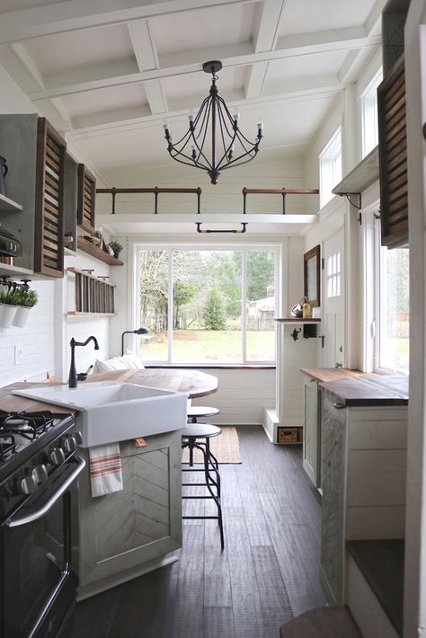 The kitchen features reclaimed walnut and oak countertops, a full size (30") four burner gas range, and a 27" farmhouse style sink. An apartment size refrigerator is also included. Apartment Size Refrigerator, Tiny Farmhouse, Tiny Kitchen Design, Tiny House Bathroom, Tiny House Kitchen, Craftsman Style Homes, Small Room Design, Tiny Spaces, Tiny House Interior