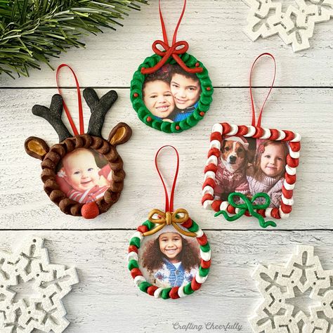 Create these festive DIY clay Christmas ornaments for the holidays! They make sweet handmade gifts and a great keepsake! Christmas Wreath Ornaments Diy Kids, Picture Orderments, Diy Wreath Ornaments For Kids, Diy Christmas Ornaments For Kids Picture, Christmas Ornaments With Photos Diy, Reindeer Photo Ornament, Grandkids Ornaments Diy, Toddler Handmade Ornaments, Felt Picture Frame Ornament