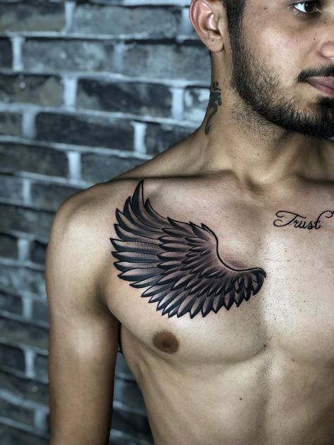 chest tattoo design for men Wing Tattoo On Chest Men, Wing Tattoo Men Chest, Wing Chest Tattoo Men, Chest Wings Tattoo Men, One Side Chest Tattoo Men, Wings Tattoo On Chest, Chest Tattoo Angel, Chest Tattoo With Meaning, Small Wing Tattoos