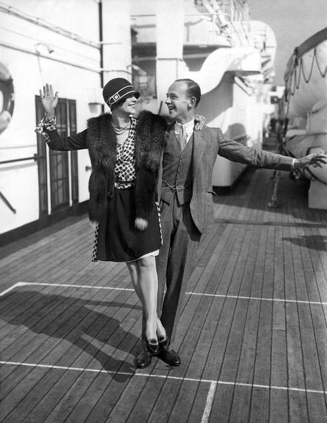 Fred and Adele Astaire, brother-and-sister dance sensations, arriving in New York on the S.S. Majestic after a stay in London. Astaire became interested in dancing after his mother sent him to keep his sister company at her dance classes. She retired early in her career. He continued on to become a major motion picture star. 1927. Adele Astaire, Roaring 20s Art Deco, Noel Coward, Dance Classes, Fred Astaire, Roaring 20s, 1920s Fashion, Dance Class, Motion Picture