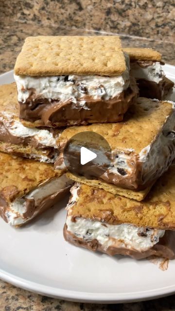 Carman Wilken on Instagram: "These Frozen S’mores Bars are a perfect summertime treat! Recipe at the end of the video 😋 #smores #frozensmores #summer #dessert #treat #icecream #4thofjuly #easyrecipe" Frozen Smores Sandwiches, Smore Ice Cream Cake, S’mores Ice Cream Dessert, Frozen Smores Recipe, Frozen Smores Bars, Cream Deserts, Carman Wilken, Frozen Smores, Smores Ice Cream