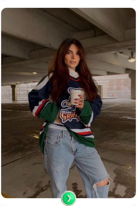 Casual and cool in an oversized jersey paired with distressed jeans. This laid-back look combines comfort and style, ideal for fans who want a relaxed game day vibe. Game Outfit Ideas, Hockey Outfit, White Striped Shirt Outfit, Hockey Game Outfit, Hockey Outfits, Oversized Jersey, Blue Jean Outfits, Game Outfit, Hockey Game