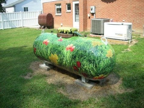 Safe and Clever Ways to Conceal Propane Tanks — Superior Energy, LLC Propane Tank Art, Gas Tank Paint, Propane Appliances, Propane Tank Cover, Enclosure Ideas, Propane Tanks, Tank Art, Lp Tank, Farm Art